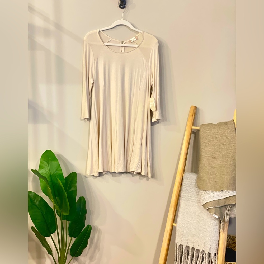 NWT. Women’s dress. Size M. Color Sandshell.